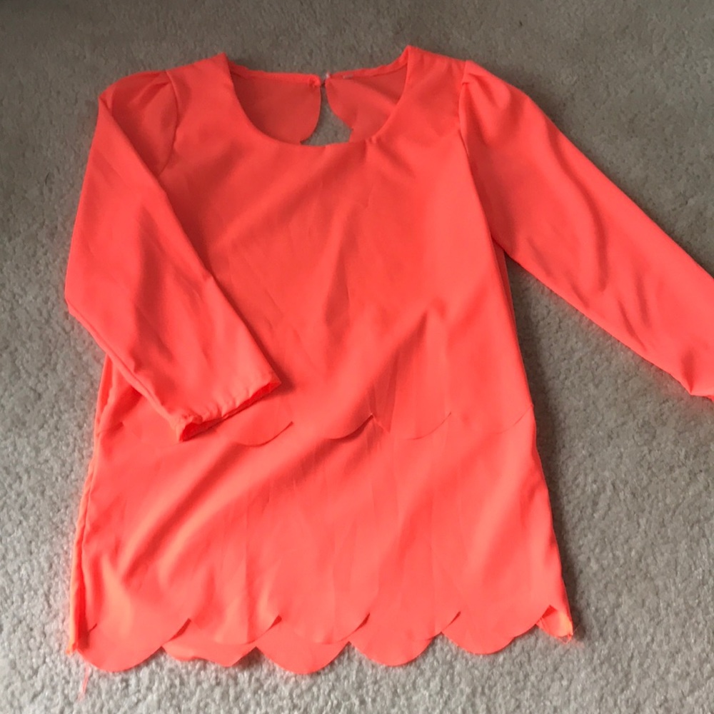 Women’s peach blouse with design